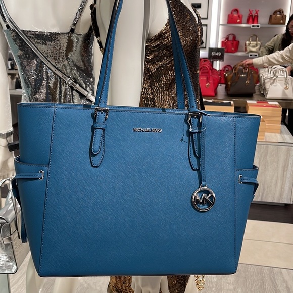 Michael Kors Gilly Large Drawstring Travel Leather Top Zip Tote
 Color: TEAL
NWT - Picture 3 of 16